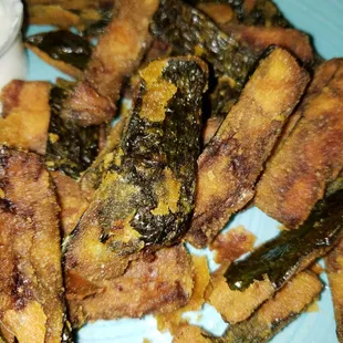 Disgusting, burnt oil soaked, soggy fried Zucchini