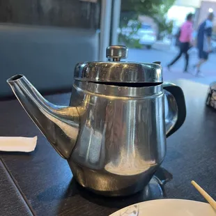 If only the teapot can talk. A worn teapot is a good sign of a good Chinese restaurant.