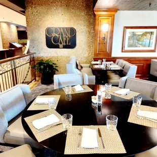 a round table with place settings
