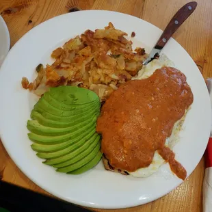 Chicken Avocado with home fries and Chipotle hollandaise