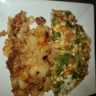 Egg white omelet with spinach,  onion and peppers and homefries