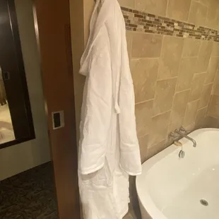 Robe to use in our suite, I hung it up to use. (It was neatly wrapped on the tub) Would have been nice to have 2 since there was 2 of us