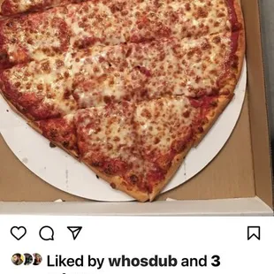 a heart shaped pizza in a box