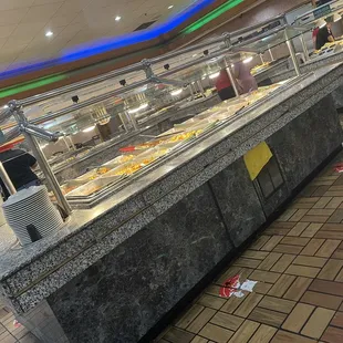 a buffet with a variety of food items