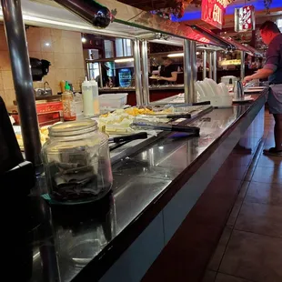 a man preparing food in a restaurant