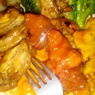 a plate of food with broccoli and chicken