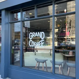 the front window of a coffee shop