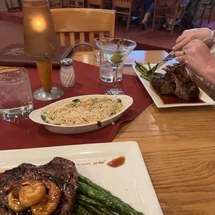 Rack of lamb and ribeye special, side of creamed spinach with Basel Hayden and cucumber martini.