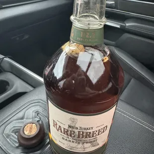 Broken cork which fell &amp; completely broke apart after plastic wrapping was removed.