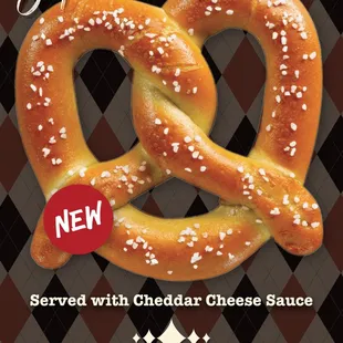 Try our new soft, shareable Super Pretzel!  Paired perfect with your favorite beer or cocktail. Served with cheddar cheese sauce.