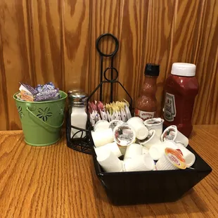 table fully equipped with condiments