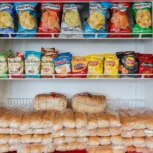 a display of sandwiches and chips