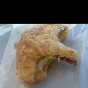 Egg, bacon, and cheese croissant.