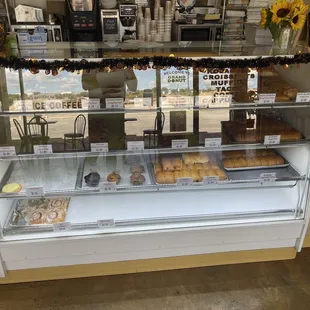 a display case filled with donuts