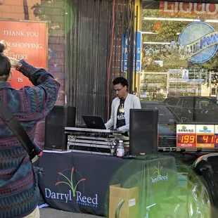 a woman standing in front of a store