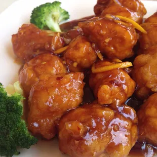 Orange chicken, this citrusy sweet dish comes with cooked-to-perfection white rice.