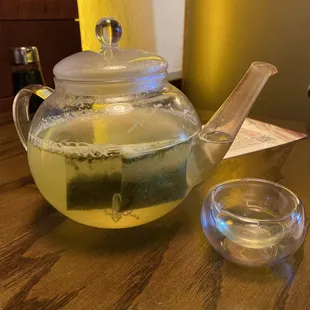 The glass for the green tea is very small