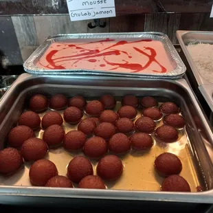 a tray of chocolate covered strawberries