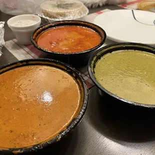 Butter chicken (left), tikka masala chicken (middle), palak paneer (right)