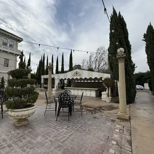 Back patio. To the right there is a large enclosed heated tent for events. (Sorry i don&apos;t have a pic).