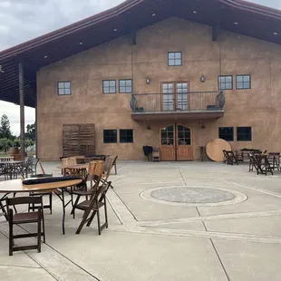 patio area with tables and chairs