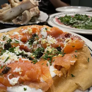 Featuring the Smoked Salmon Flatbread (Nosh) and from left to right, the Bone Marrow (special Nosh) and Beef Carpaccio (also Nosh)