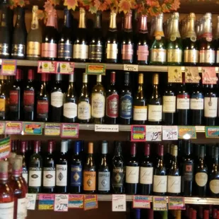 a variety of wines on shelves
