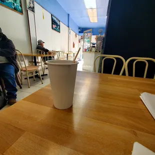 a coffee cup on a table