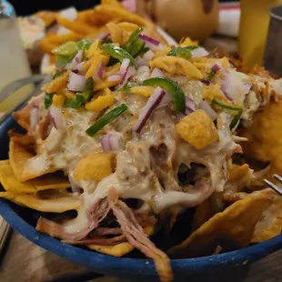 El borracho nachos with pulled pork.