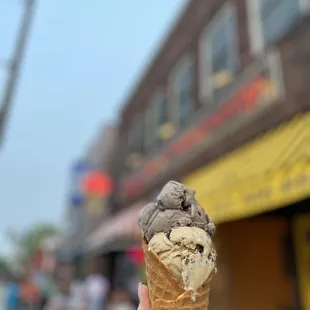 waffle cone split single scoop: s&apos;mores on top and coffee break on bottom