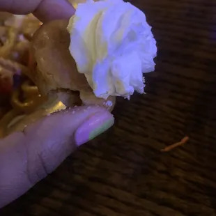 A nasty dry dessert with stiff whipping cream.