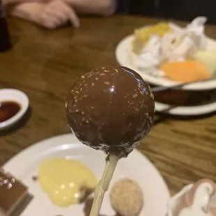 Yummy Sesame Balls dipped in chocolate from the Chocolate Fountain.