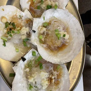 a plate of scallops on a table