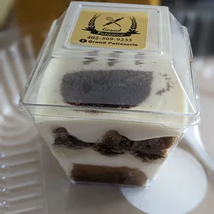 a dessert in a plastic container