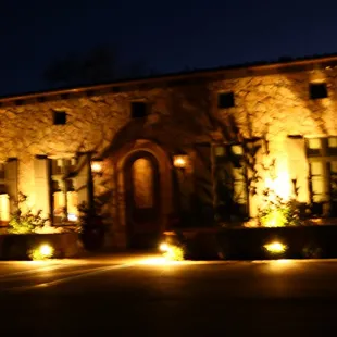 Exterior of entrance to the building at night