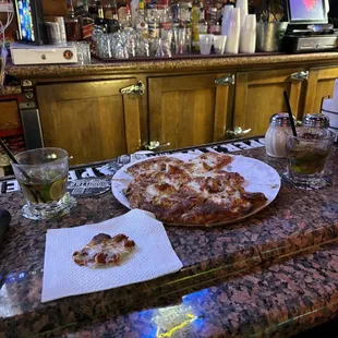 Jakeenos sausage and pepperoni pizza with a great rum and diet drink.