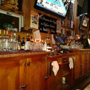 a bar with a large television