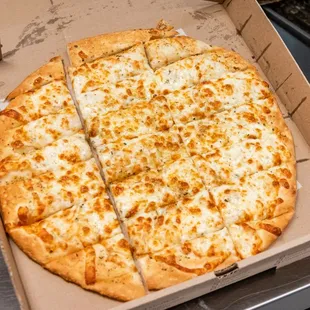 a cheese pizza in a box