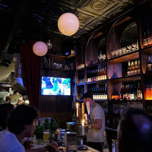 a man serving food in a restaurant