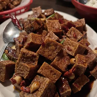 Kung Pao Tofu extra spicy. Try it on the Lo Mein instead of rice- delicious!