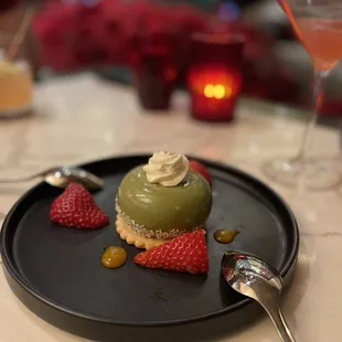 Green tea cake made of green tea mousse, mango yuzu cream, and passion crunch, so good, one of my faves