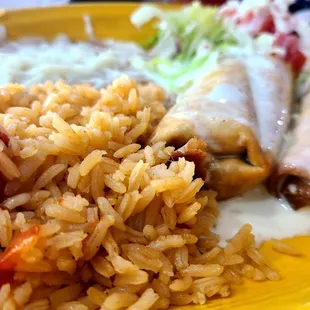 GRANDE BURRITO - Chimichanga ("Hard" &amp; with Beef option) served w/ Rice and Refried Beans (Side option)