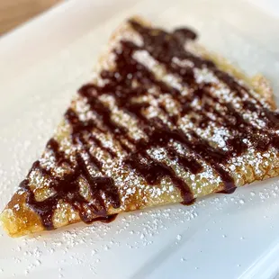a slice of pastry on a plate