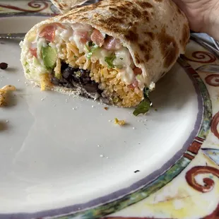 The burrito fresco with rice is SO incredible- this is the veggie version, but I imagine the meat is just as good.