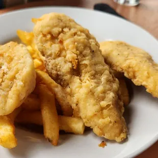 a plate of fried fish and chips