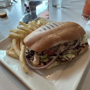 Pastor torta, good not amazing, needed more spice and flavor. Lengua taco was much better. Great bread and accouterments