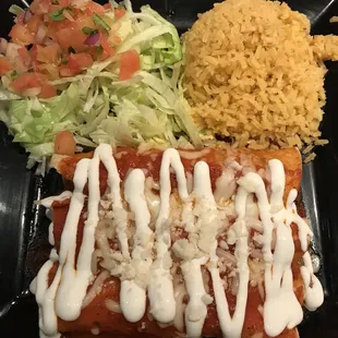 Enchiladas with rice. (It does come with beans as well)