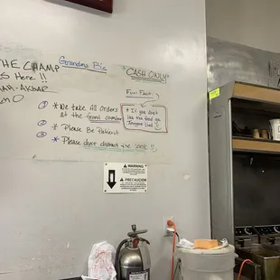 a kitchen with a clock on the wall