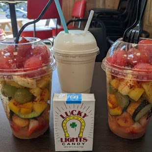 Dinner of champions!  Fruit cups are delicious and fresh, with options to add some flair.