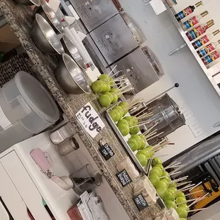 a kitchen counter with apples
